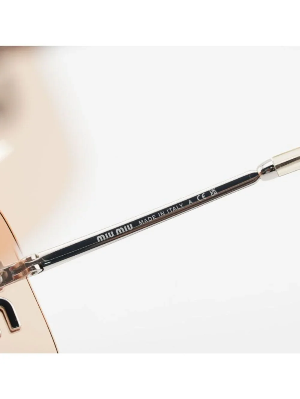 Miu Miu MUB53S 1BC80Y Sunglasses Silver Shield Frame, Orange Lenses
